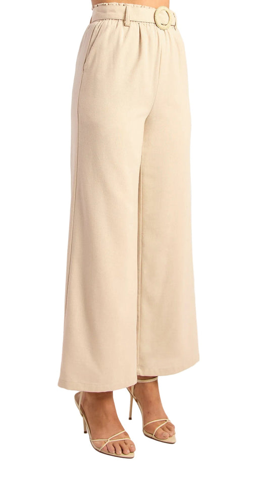 Beige wide-leg pants on a white background