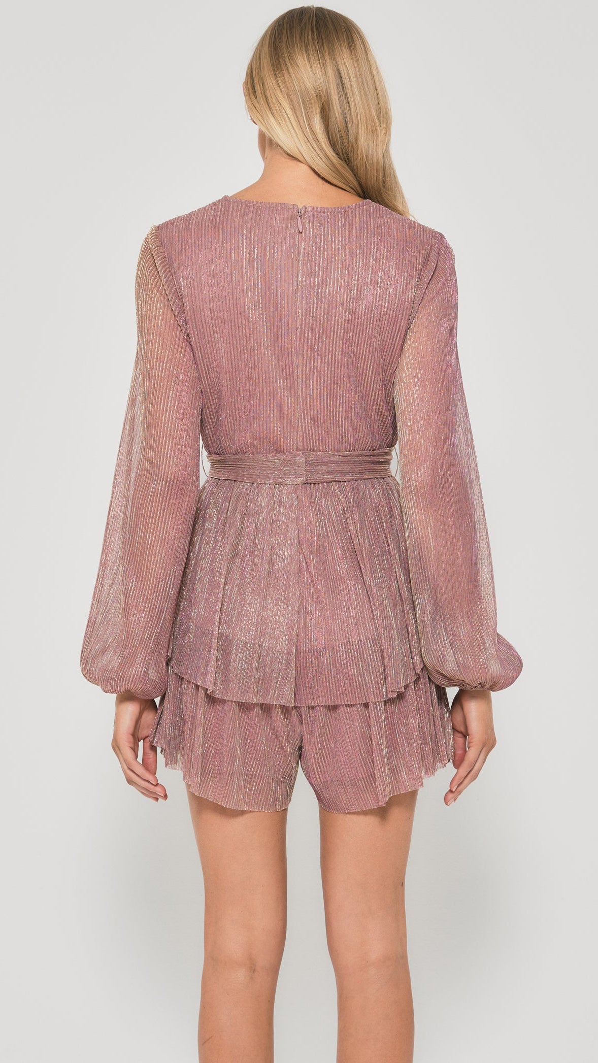 Back view of mauve playsuit with gold shimmer and sheer sleeves - Eva Jean Collective.