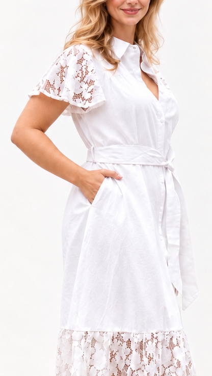 Close up showing collared neckline, lace sleeves, tie belt, button down front and lace hem.