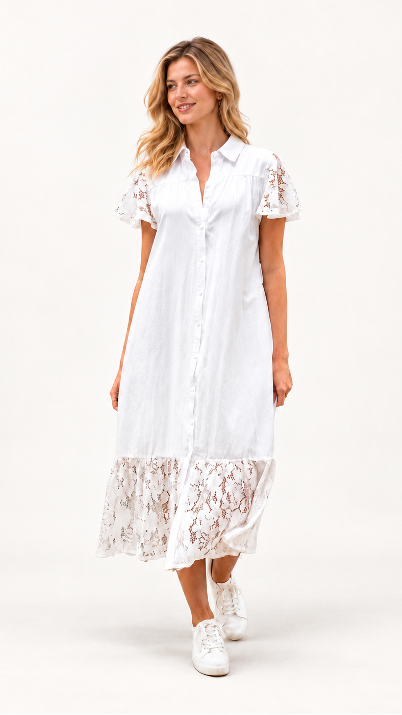 A woman modeling a white short-sleeve midi shirt dress with lace trim on the sleeves and hem, paired with white sneakers, against a plain white studio background.