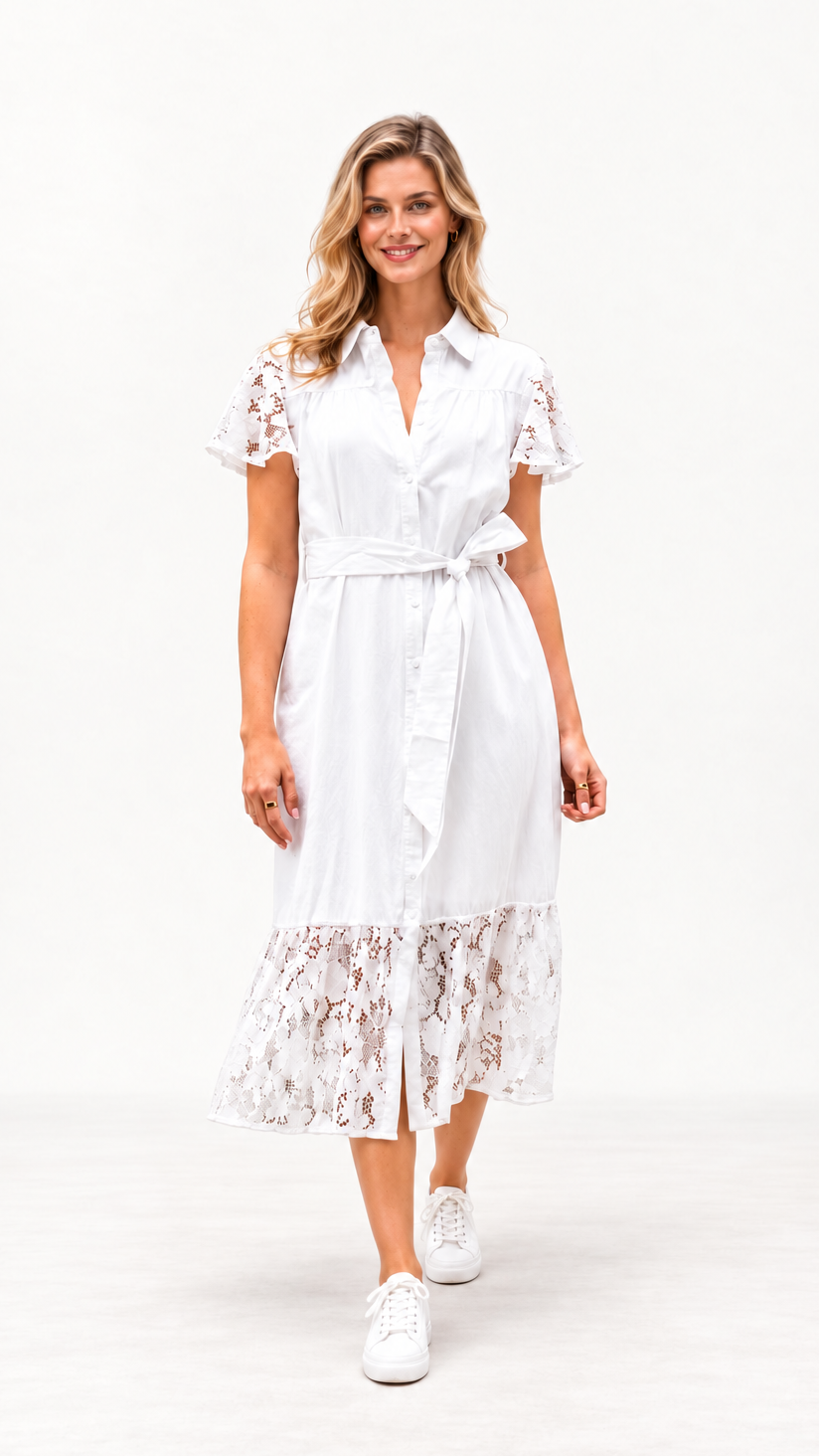A woman modeling a white midi shirt dress with short lace flutter sleeves, a tie waist, and a lace hem, paired with white sneakers, against a plain white studio background.