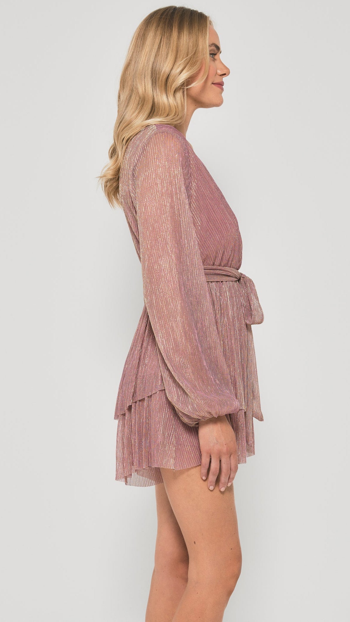 Side profile of plissé playsuit with gold details and self-tie waist - Eva Jean Collective