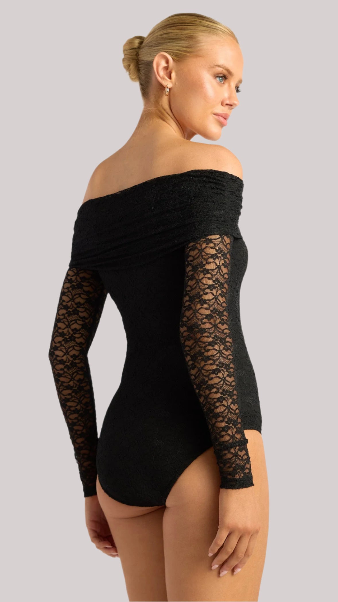 Back and side profile of the Amara Lace Bodysuit showing lace sleeve detail and neckline fit.