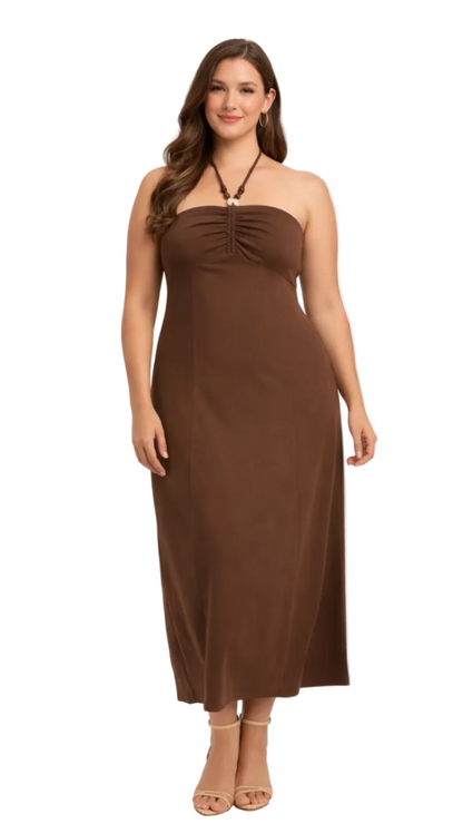 Woman wearing a brown strapless dress on a white background