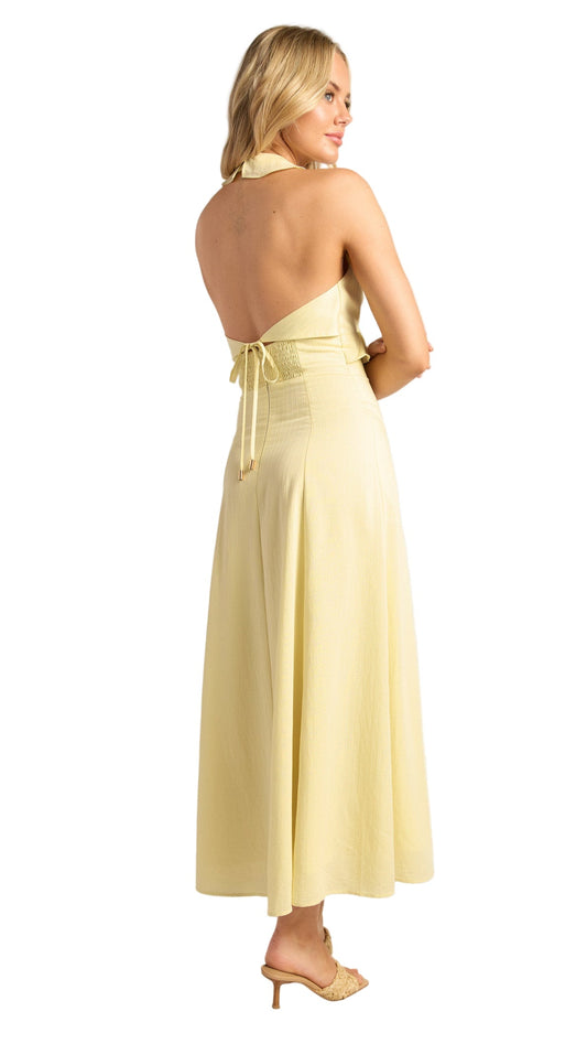Side view of the Buttercup Elan Dress showing the flowy midi length 