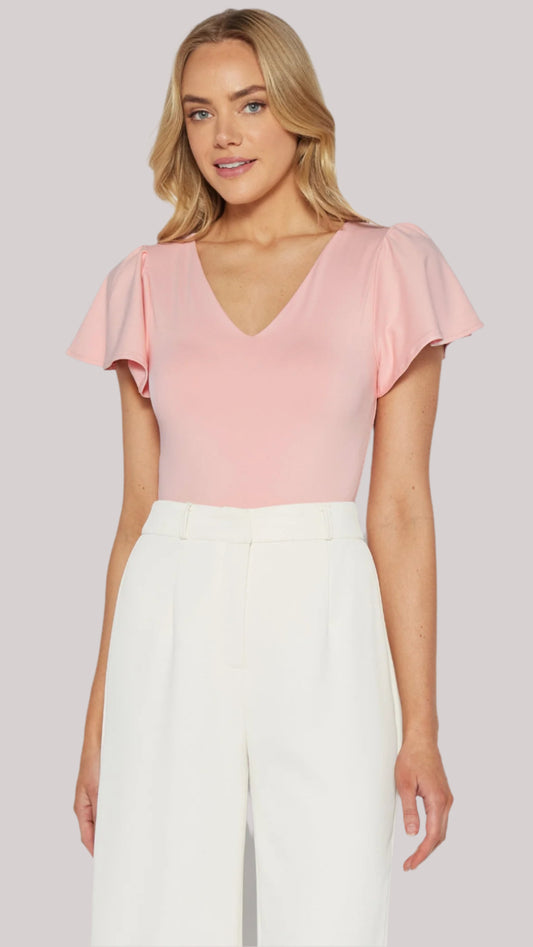 Pink butterfly sleeve bodysuit styled with high-waist trousers