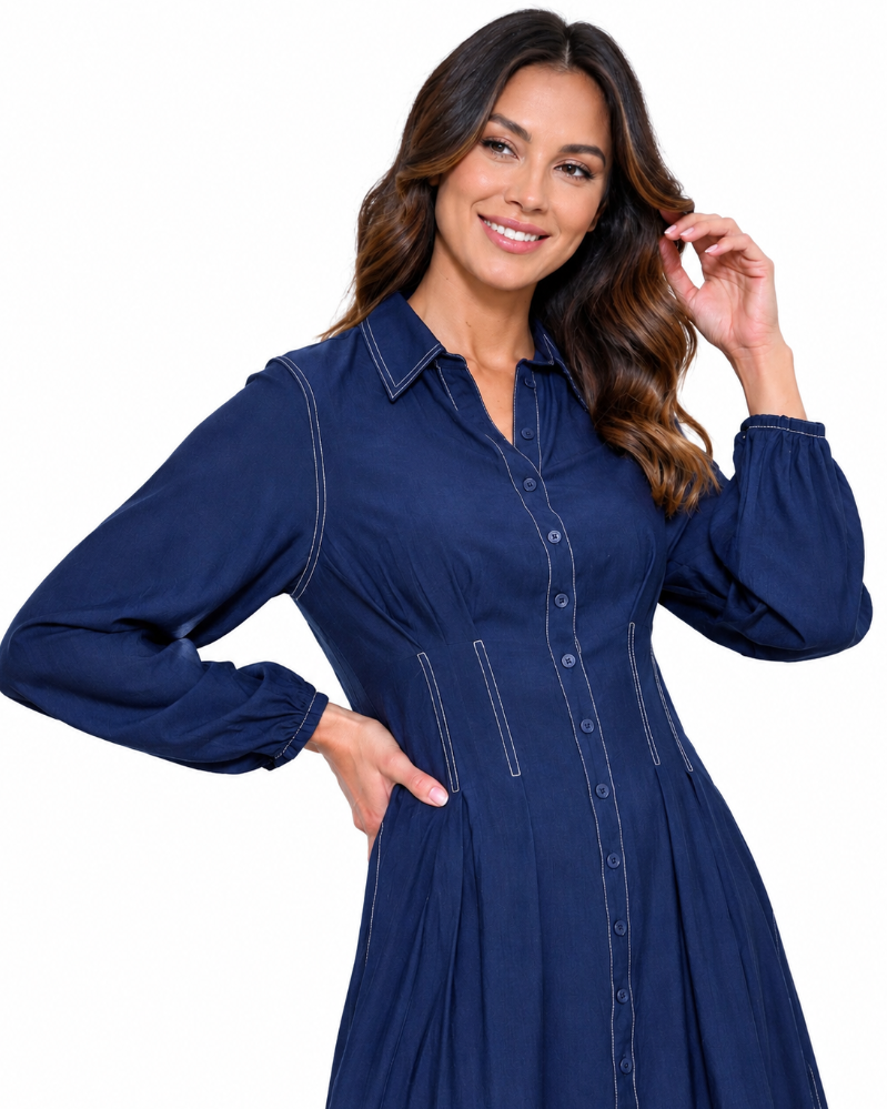 Close up of The Ellis Dress in Navy showing stitching detail and sculpted seam panel