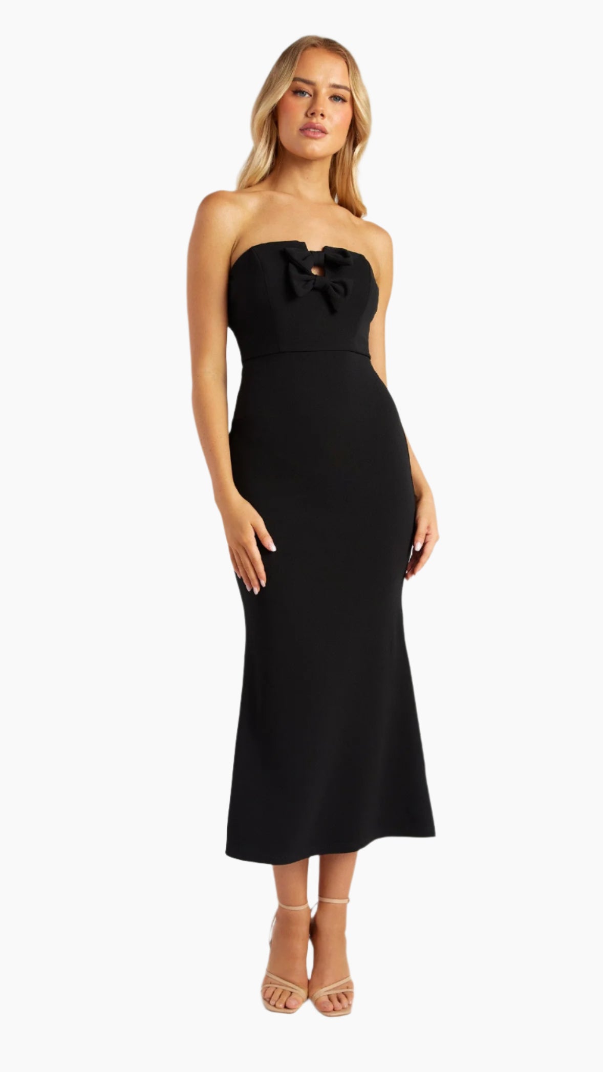 Model wearing strapless black midi dress with bow detail – front angle