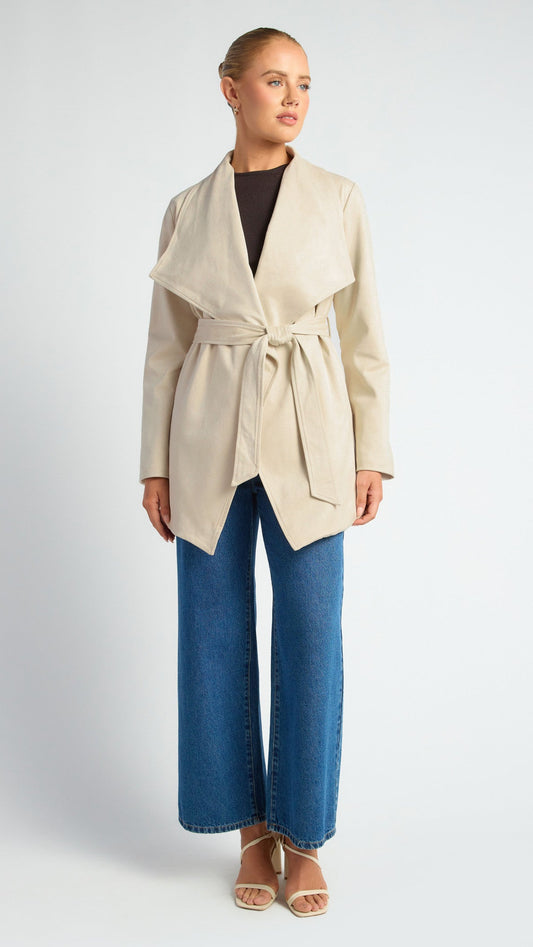 Model styling the Ivana Waterfall Jacket with denim jeans for a casual yet refined look