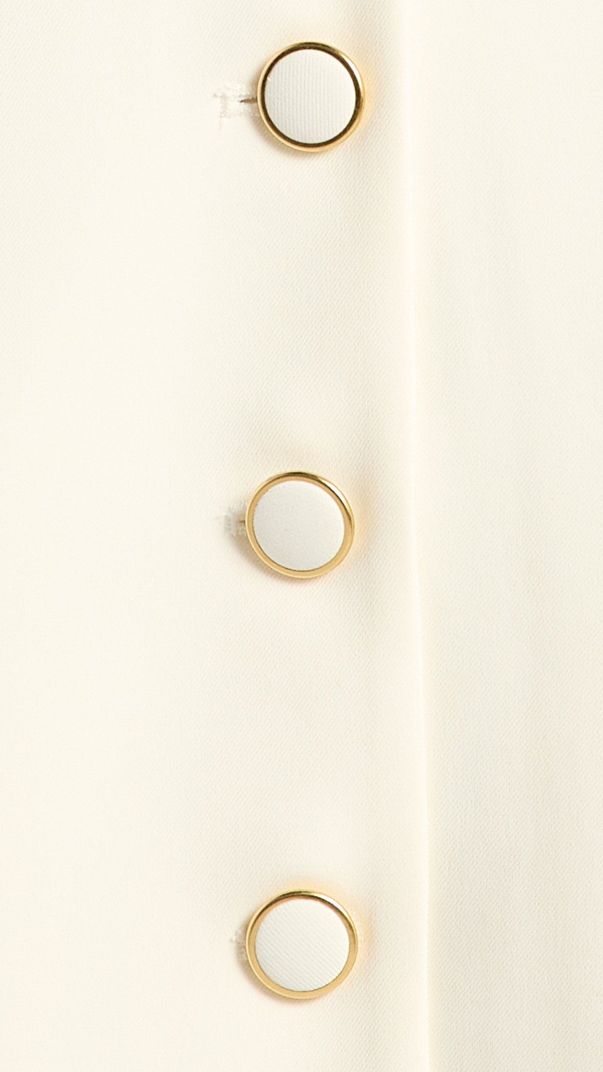 The Ivory Prelude - gold-rimmed ivory buttons
