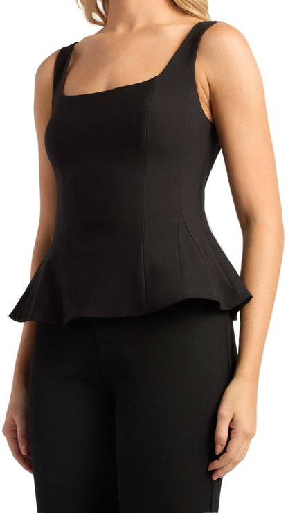 Black peplum top worn by a person on a white background