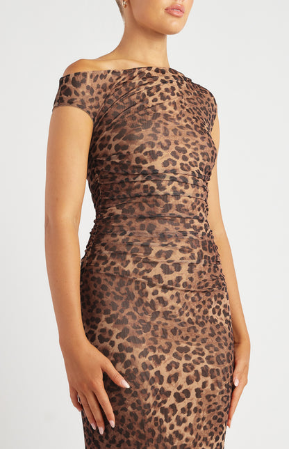 Close up view showcasing the ruched seams of the Untamed Elegance Dress.