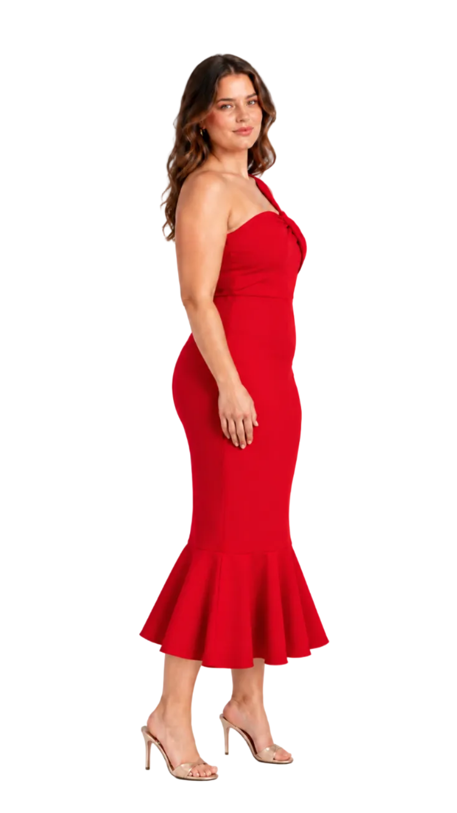 A woman modeling a bright red one-shoulder midi dress with a ruffled hem, paired with clear high-heeled sandals, against a plain white studio background.